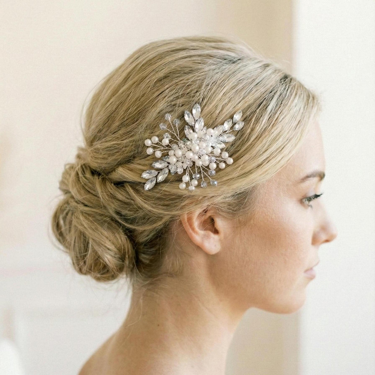 Planned back view of the silver-tone bridal hair comb showing its comb teeth and the attachment of the decorative branches.