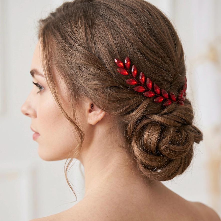 Benötigte Rück- oder Seitenansicht einer Haarnadel, die den Übergang vom roten Schmuckzweig zur schwarzen gewellten Pin-Basis zeigt.